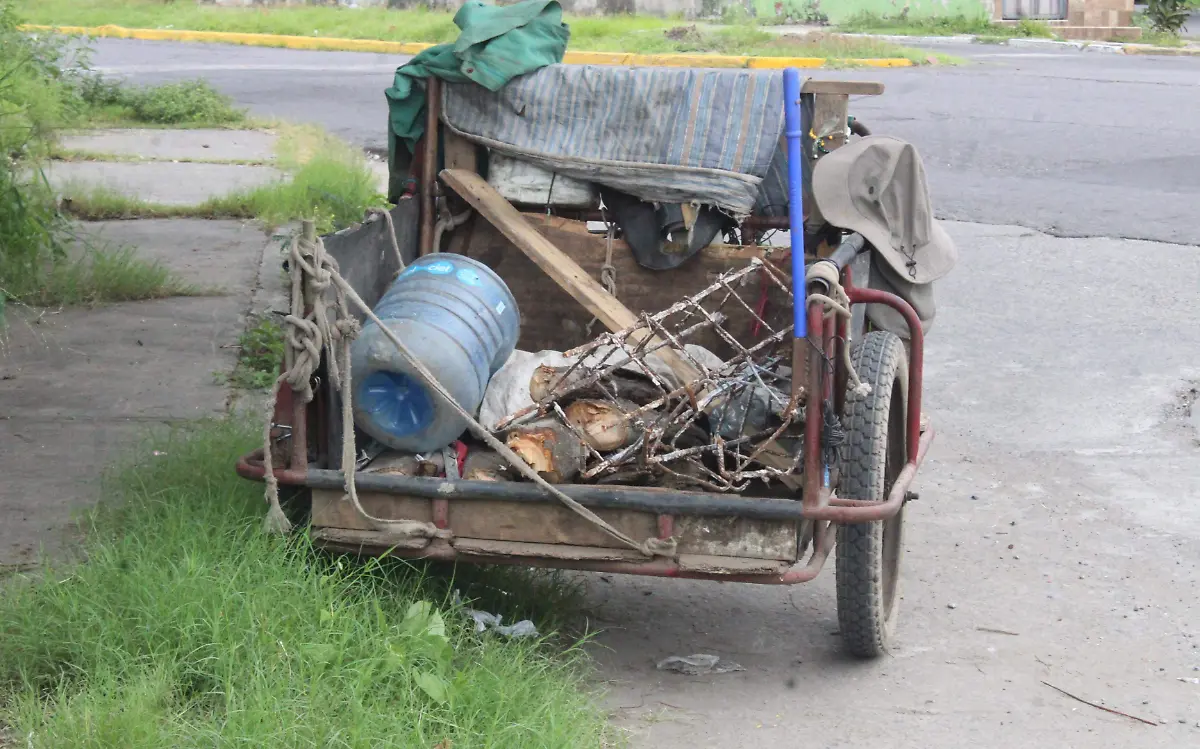 Triciclo de don humberto donde transporta lo pepenado